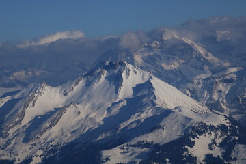 Fototapeta na wymiar Snow covered peaks seen from Mount Pilatus.