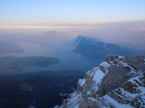 View from Mount Pilatus towards Horw. Buergenstock throwing a shadow at Mount Rigi.