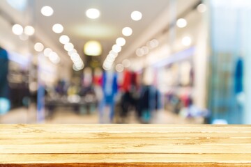 Wood table top with supermarket grocery store background for product display