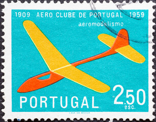 Portugal - circa 1960: a postage stamp from Portugal, showing a model plane. Aero Club of Portugal...