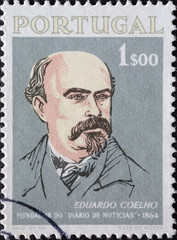 Portugal - circa 1964: a postage stamp from Portugal, showing a.Portrait of Eduardo Coelho (1835-89) journalist and founder