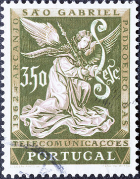 Portugal - circa 1962: a postage stamp from Portugal, showing an image of the mighty Archangel Gabriel. olive.