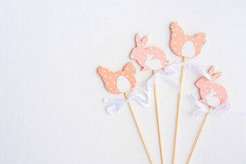 Obraz premium Easter pastel decorations with easter bunnies on a white background