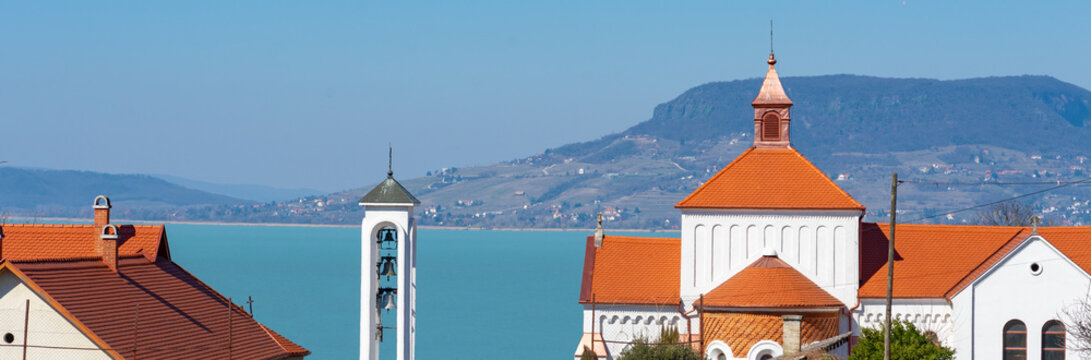 Nagybolgogasszony church in Fonyod Hungary with Lake Balaton background