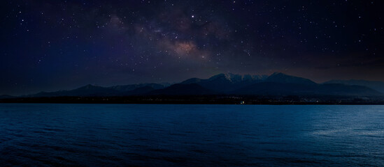 Fototapeta na wymiar Landscape with Milky Way. Night sky with stars on the mountain