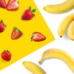 Creative layout made of strawberry and bananas on the background. Food concept.