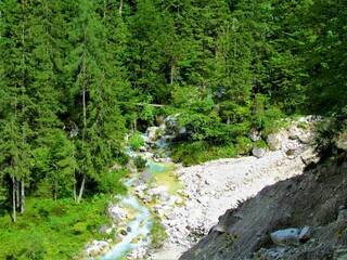 Martuljek creek above Gozd Martuljek in Triglav national park and Julian alps, Slovenia surrounded...