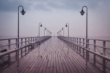 Beautiful pier on the Polish sea. Pier in Gdynia, Poland on a cloudy day.