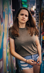 Naklejka premium Street style photo shoot with a young pretty woman in the colorful streets of Miami - travel photography