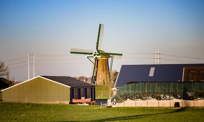 Deurstickers NOORDWIJK BINNEN, NETHERLANDS. FEBRUARY 27, 2022. Beautiful view to the mill © Sirius1717