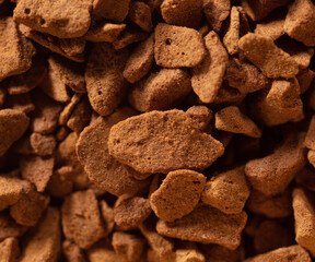 Instant coffee granules as background.