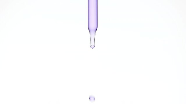 Drops of violet clear fluid are falling down from lab dropper