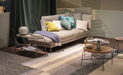 cozy grey and beige ottoman with comfortable interior cushions for a large airy living room