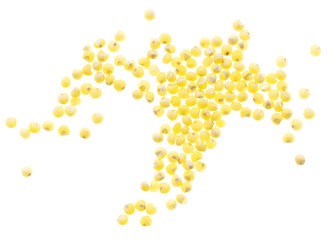 Millet groats isolated on a white background.