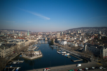 Fototapeta na wymiar Aerial view of City of Zürich with old town and river Limmat on a sunny spring afternoon. Photo taken March 4th, 2022, Zurich, Switzerland.