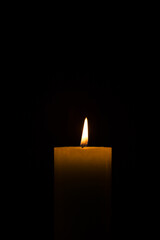 Warm candlelight on a dark mysterious background