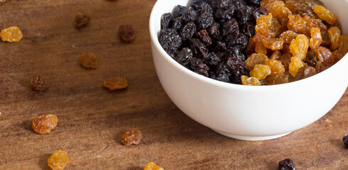 Raisins in white bowl