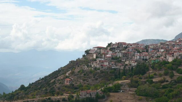 Beautiful greek village Arachova in the mountains of Greece, Europe. An area near the ancient Greek city of Delphi. Historic Village on a Hill.	
