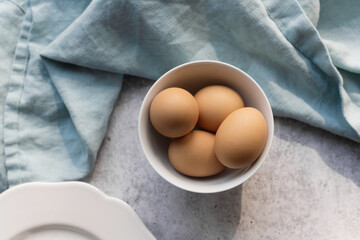 Bowl of eggs on counter
