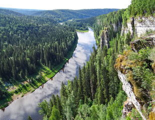 Picturesque rock Chertov Finger and Usva river. View from above. Massif Usvinskiye Pillars. Perm region. Russia