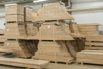 oak furniture boards in the warehouse of woodworking production