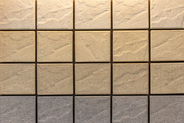 stone wall cut small squares together,interior material,brown stone wall