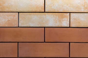 Rectangular stone walls, paving lines, alternating stone materials, wall coverings in interior or exterior applications.