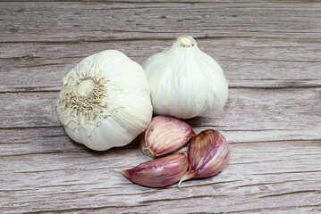 Fresh garlic on a rustic wooden table. Garlic cloves