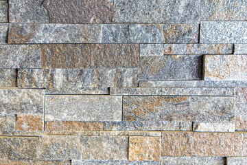 The stone wall is cut from small slabs to form a horizontal,Interior decoration materials,gray stone wall