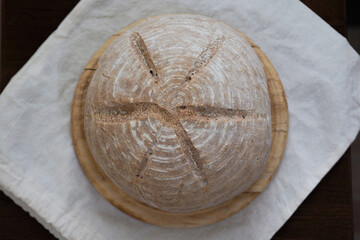 fresh homemade bread on a wooden board close up