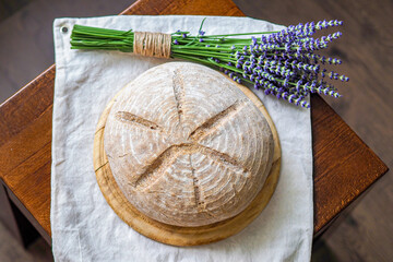 fresh homemade bread on a wooden board close up
