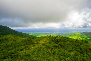 Aerial view of the south coast of Mauritius island from a hill located near Piton Savanne