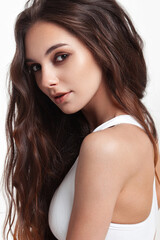 Fototapeta premium Beautiful girl in white lingerie on white background.