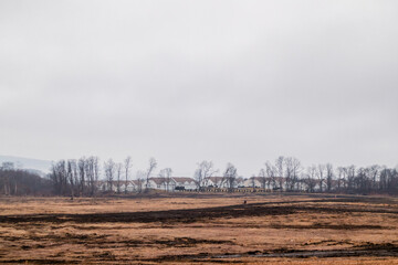Distance view of a small residential neighborhood near Newport, Rhode Island, on a snowy winter morning