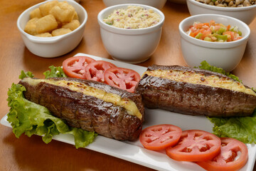Sun meat and side dishes. Carne de sol, salted steak, typical dish from the Brazilian northeast.