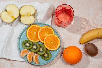 Fruit on the table with harsh light and shadows
