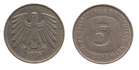 Germany - circa 1975 : a 5 German Mark coin of the Federal Republic of Germany with the cote of arm...