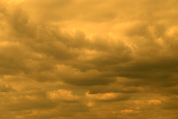 yellow sky gray clouds background