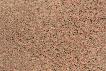 Texture of natural gray and orange granite stone surface we see in the photo