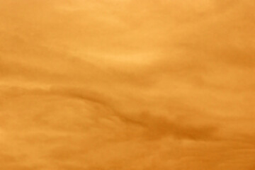 Orange yellow clouds over the roofs of Augsburg city during Sahara dust storm