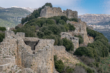 Fototapeta na wymiar View of the Southern Wall of Nimrod fortress with the Keep and the Beautiful Tower, located in Northern Golan, at the southern slope of Mount Hermon, the biggest Crusader-era castle in Israel