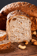 Wholemeal sourdough bread topped with sesame seeds and chestnuts