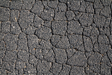 Cracked and abstract grunge texture. Aged material surface backdrop. Weathered effect pattern. Old and dirty background.
