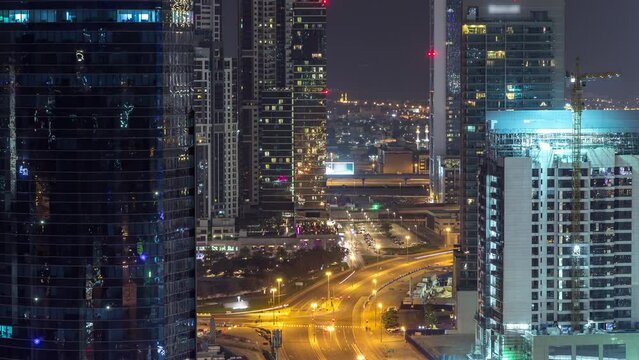 Dubai business bay towers night timelapse aerial