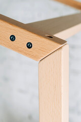 The image of the child's bed, plank joints, details against the backdrop of the white ceiling.