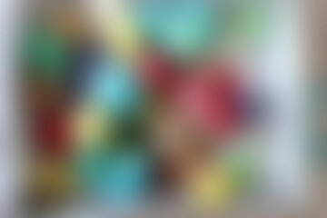 Multicolored abstract defocused background. Blurred lines and spots. Bright colors. Background for the cover of a notebook, book, laptop screen.