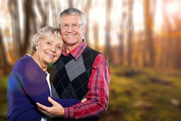 Obraz premium Happy active senior couple outdoors posing