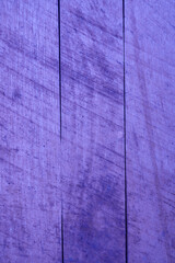 Purple-violet painted boards of an old village house. Texture and Background. High quality photo