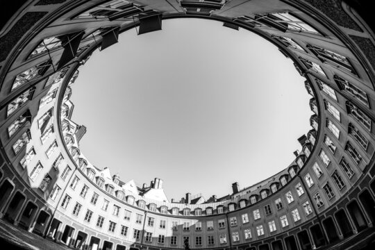 The black and white artistic picture of round square called Brantingtorget in Stockholm in Sweden. 