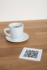 QR code for online menu service at table in restaurant. New contactless technology lifestyle protection coronavirus pandemic in restaurant. 
